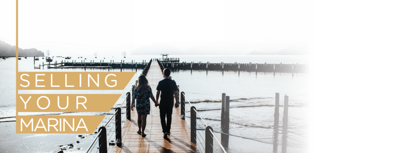 Couple walking down a dock