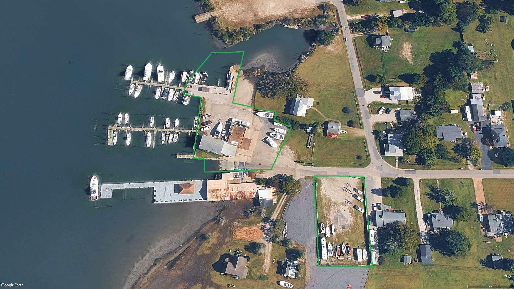Aerial view of marina with docks and boats